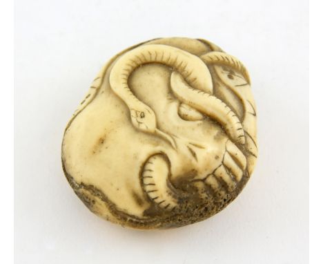 AMENDED DESCRIPTION Japanese carved bone netsuke of a snake entwined inside a skull, 5cm,