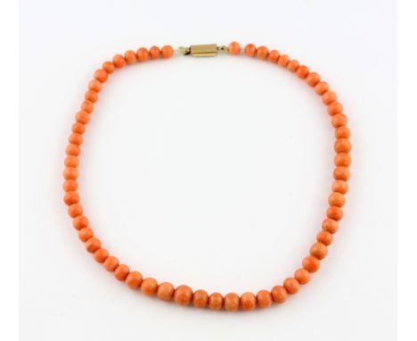 Graduated coral bead necklace, round bead 6mm to 8mm in diameter, strung without knots, measuring approximately 38cm in lengt