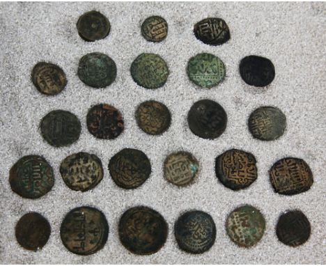 Group of ancient bronze Islamic coins, mainly with script only, one within hexafoil another marked with a star (24)provenance