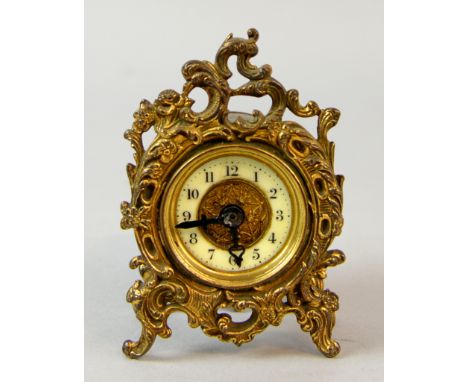 French brass scroll and foliage decorated alarm clock with enamel dial 10 cm 