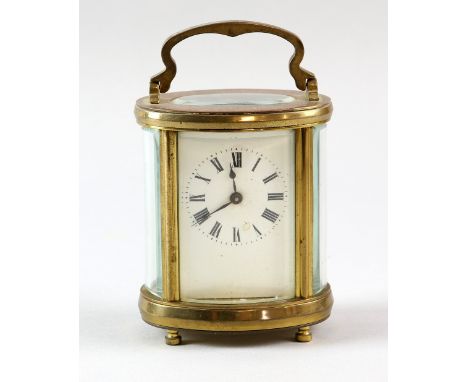 Brass and glass oval carriage clock with lever escapement 16 cm