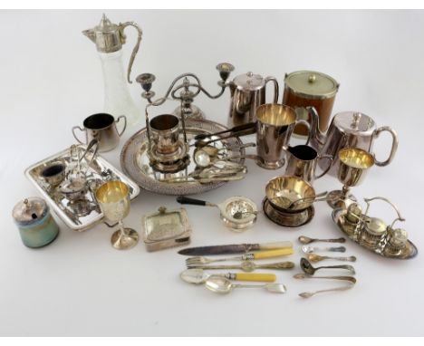 Silver plated items to include a jug, goblets, candelabrum, teapot and coffee pot, flatware, tea strainer, etc.,.   