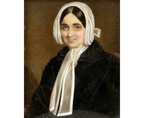 Two 19th century portrait miniatures, one depicting a young woman in a blue dress and white bonnet, the other a woman in blac