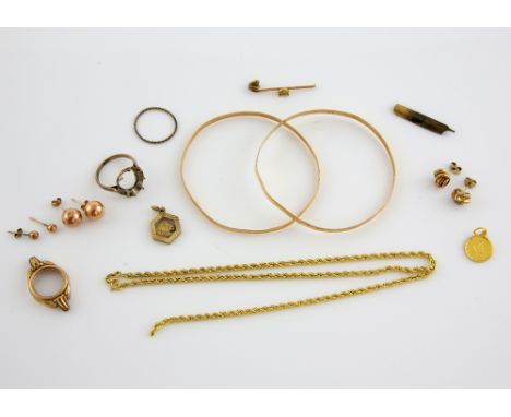 Group of gold jewellery, two bangles, a ring mount, both  testing as 14 ct, other items in 9 ct gold PROVENANCE: Sold on beha