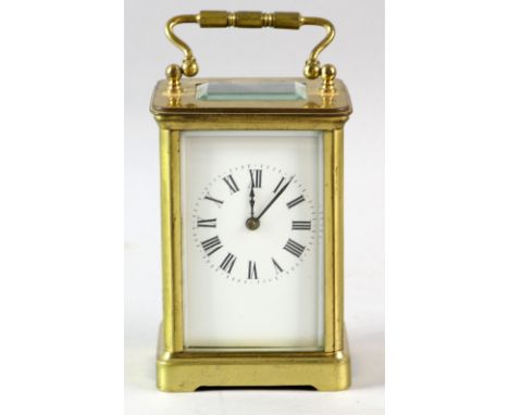 French brass carriage clock in plain case 14cm high overall