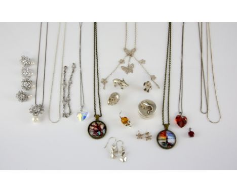 Silver jewellery items and silver animals including rabbit, elephant, penguin and mouse, together with two brass enamel penda