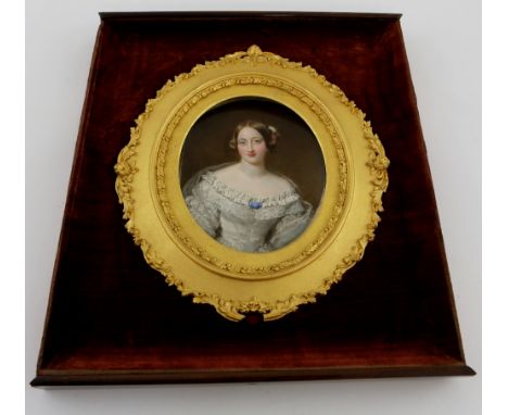 In the manner of Sir William Charles Ross RA, oval portrait miniature of a lady, on ivory, in white dress with blue brooch, i