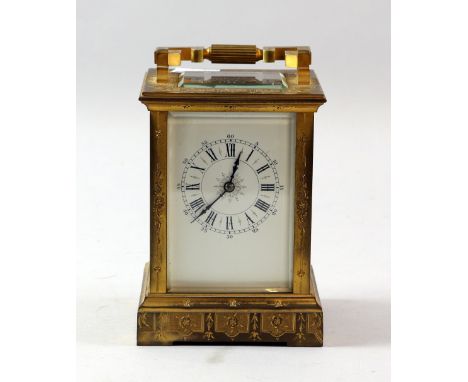 19th century French gilt bronze carriage clock, with 8 day movement,  the case bright cut engraved with flowers, striking on 