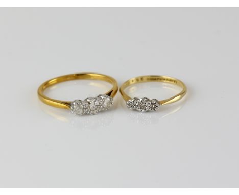 Three stone diamond ring, set with three transitional cut diamonds, estimated total diamond weight 0.40 carats, estimated col