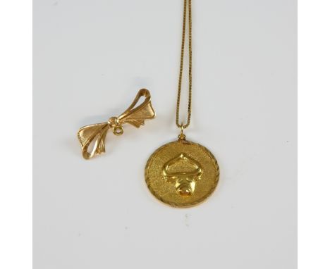 Taurus pendant, in yellow metal testing as 18 ct, with box chain, measuring approximately 69cm in length, with bolt ring clas