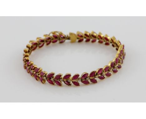 Ruby and diamond bracelet, marquise cut rubies and round brilliant cut diamonds, with a concealed clasp and safety catch. mou