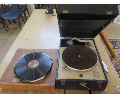 A Decca 50 wind-up portable gramophone with a selection of 78rpm records, motor runs, some wear to case 