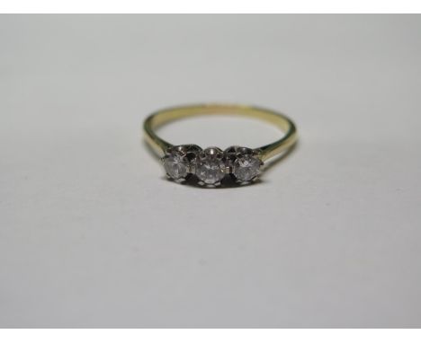 A yellow gold three stone diamond ring, each of approx 0.12cts - Size S 1/2 - weight approx 2.4 grams - tested to 18ct gold -