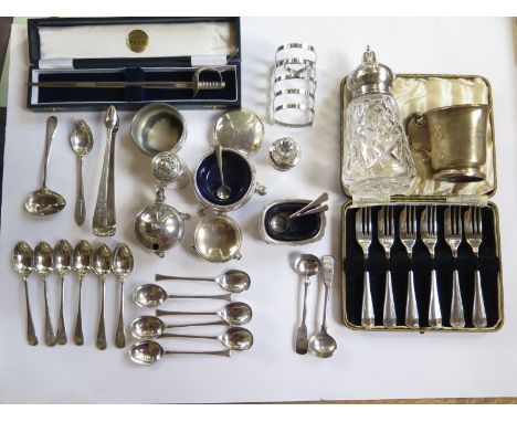A collection of assorted silver including flatware, cruets, a toast rack and a sword letter opener - total weigh-able silver 