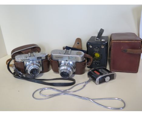 Two Voigtlander Vito B cameras, a box camera and a light meter 