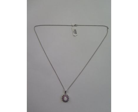 A hallmarked 9ct white gold opal and pink topaz pendant necklace - approx 3 grams - ex jewellers stock, new condition 