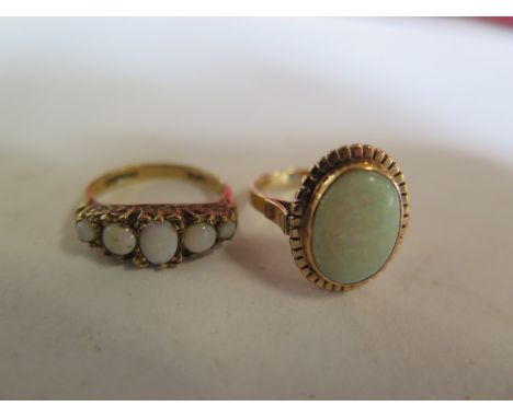 two 9ct gold opal rings, sizes J and L, approx 7 grams 