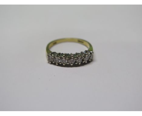 An 18ct yellow gold seven stone diamond ring, size K, approx 2.8 grams - generally good, some usage, diamond bright 