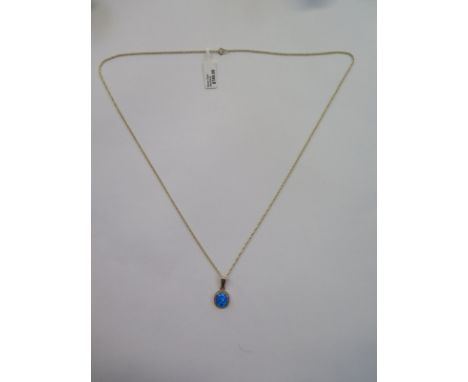 A 9ct gold opal pendant necklace, hallmarked to pendant, approx 1.9 grams - ex jewellers stock, new condition 