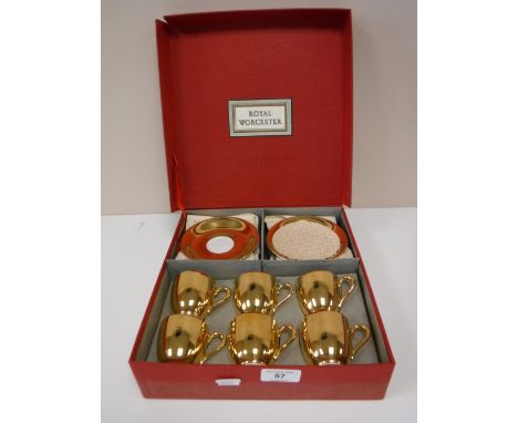 A boxed Royal Worcester twelve piece golden silver lustre tea set 