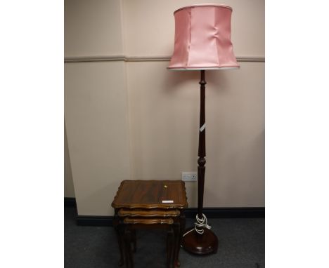 A nest of three inlaid mahogany table and a mahogany standard lamp with shade 