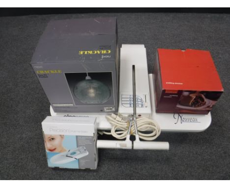 A Nouveau clothes press, together with a hair epilator, a boxed Lakeland pudding steamer and a Crackle pendant light fitting 