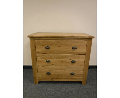 A good quality light oak three drawer chest, width 98cm
