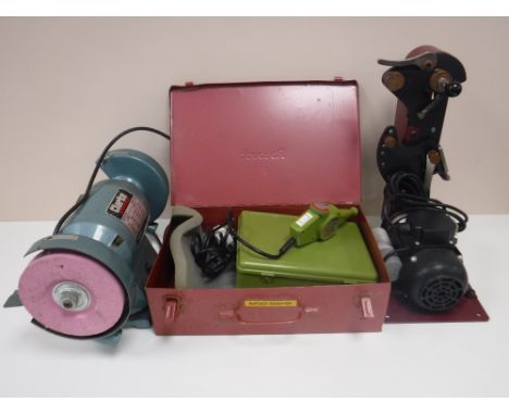 A Clarke bench grinder, together with a cased Burgess engraver and a pro edge belt sander