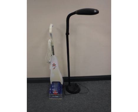 A Bissell Quick Wash carpet cleaner, together with an adjustable floor lamp