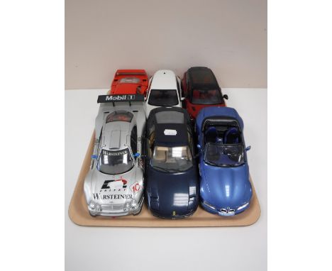 A tray containing six large scale die cast vehicles, including Maisto, Burago, sportscars, Ferraris, etc 