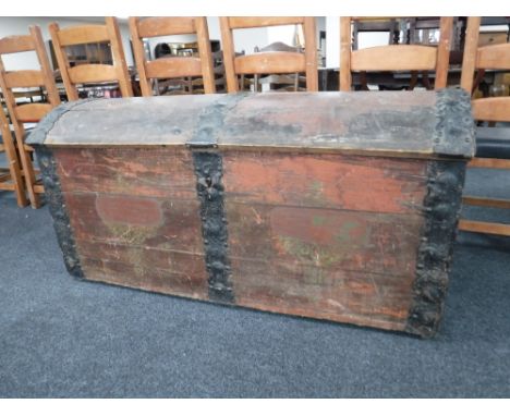 A 19th century pine metal bound domed topped shipping trunk 