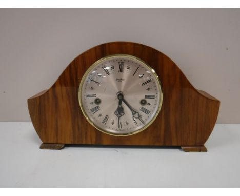 A walnut cased Bentina eight day mantel clock 