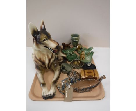 A tray of Wade pieces including pipe holders, ash trays, tortoise, long boat and a large figure of an Alsatian 
