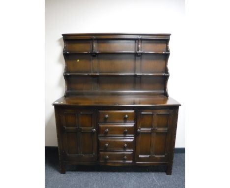 An Ercol farmhouse dresser, width 147cm