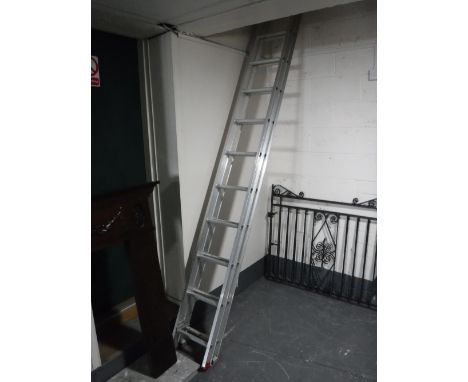 An aluminium eleven rung twin section extension ladder 