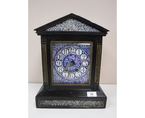 A Victorian ebonised cased mantel clock with blue porcelain dial