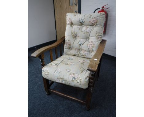 An oak barley twist button back adjustable armchair 