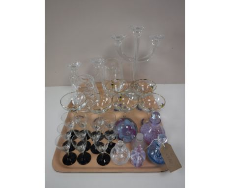 A tray of Babycham glasses, liqueur glasses, glass Caithness perfume bottle and four others, glass paperweight, candelabra et