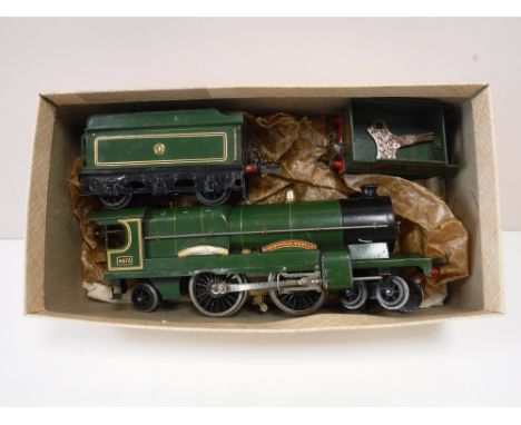 A mid twentieth century tin plate Caerphilly castle engine with two wagons and key 
