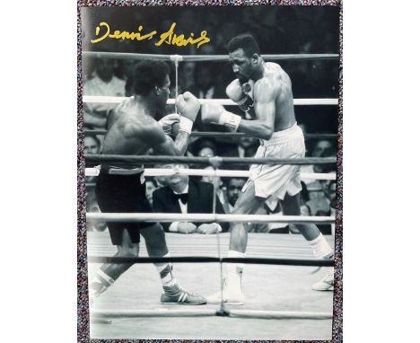British Boxer Dennis Andries MBE Signed 16x12 Black and White Photo. Signed in Gold Marker Pen. Dennis Andries MBE, born 5 No