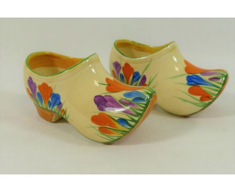 A pair of Clarice Cliff crocus pattern clogs, with painted Bizarre pattern marks, 11cm long CONDITION REPORT: Condition repor