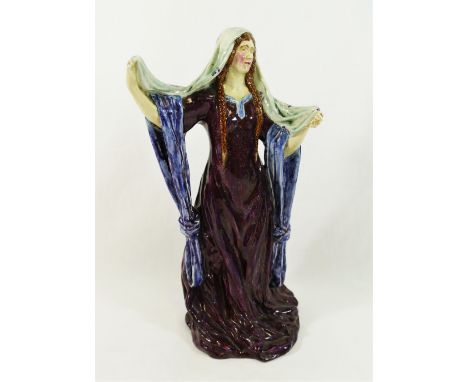 An early 20th century pottery figure of Ellen Terry playing Lady Macbeth, 30cm high CONDITION REPORT: Condition reports have 