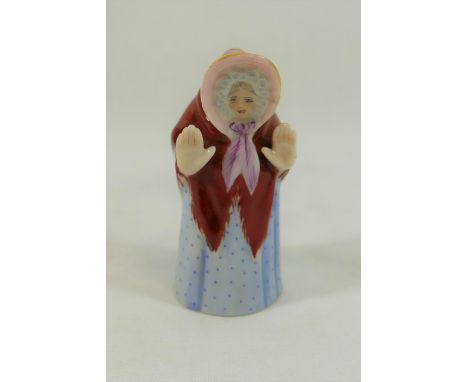 A Royal Worcester porcelain candle snuffer, 'Granny Snow', puce mark, c.1903, 7.5cm high CONDITION REPORT: Condition reports 