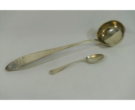 A large 18th century German silver soup ladle, with armorial engraving, 38cm long, 7.54ozt, 234.6g, and a single Georgian sil