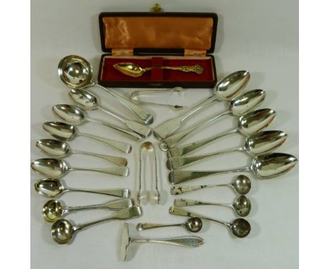 Assorted silver cutlery including a silver sauce ladle, sugar nips, salt and mustard spoons, pusher and various tea and desse