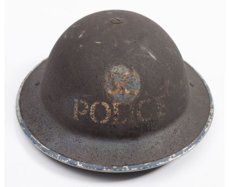 A WWII Special Constable Police Brodie helmet:, with original liner stamped and  dated 1939.