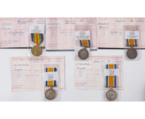 A group of four Devonshire Regiment War Medals and a Victory Medal:, '205926 Pte R Steward'   '65302 Pte C Winsland''20597 Pt