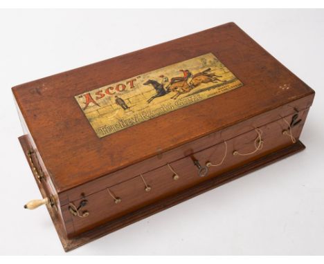 A mahogany cased 'Ascot. The New Racing Game', by Jaques &amp; Son ,London:, with lithograph label to cover as per title, the