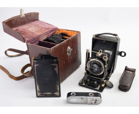 A Zeiss Ikon 'Compur-Rapid'  250/3 Ideal camera:, with Carl Zeiss Jena  Tessar  F12cm lens, together with plate holders in a 