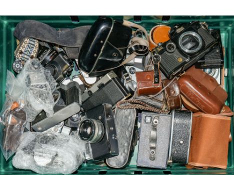 A collection of various cameras including a Box Brownie:, a German made Minox Spy camera with additional flash unit in case, 
